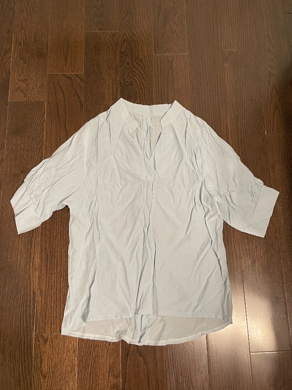 Light Blue V-Neck Button-Back Blouse